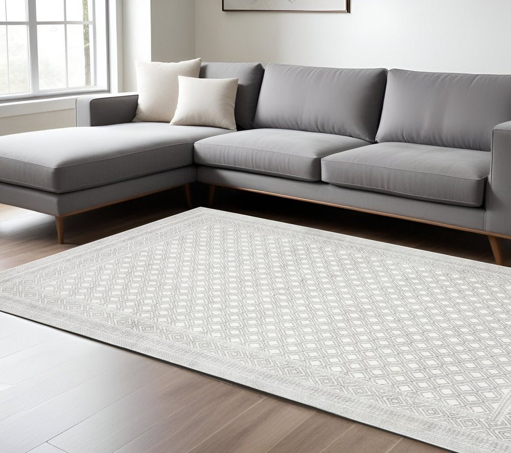 8' X 11' White And Gray Oriental Distressed Area Rug