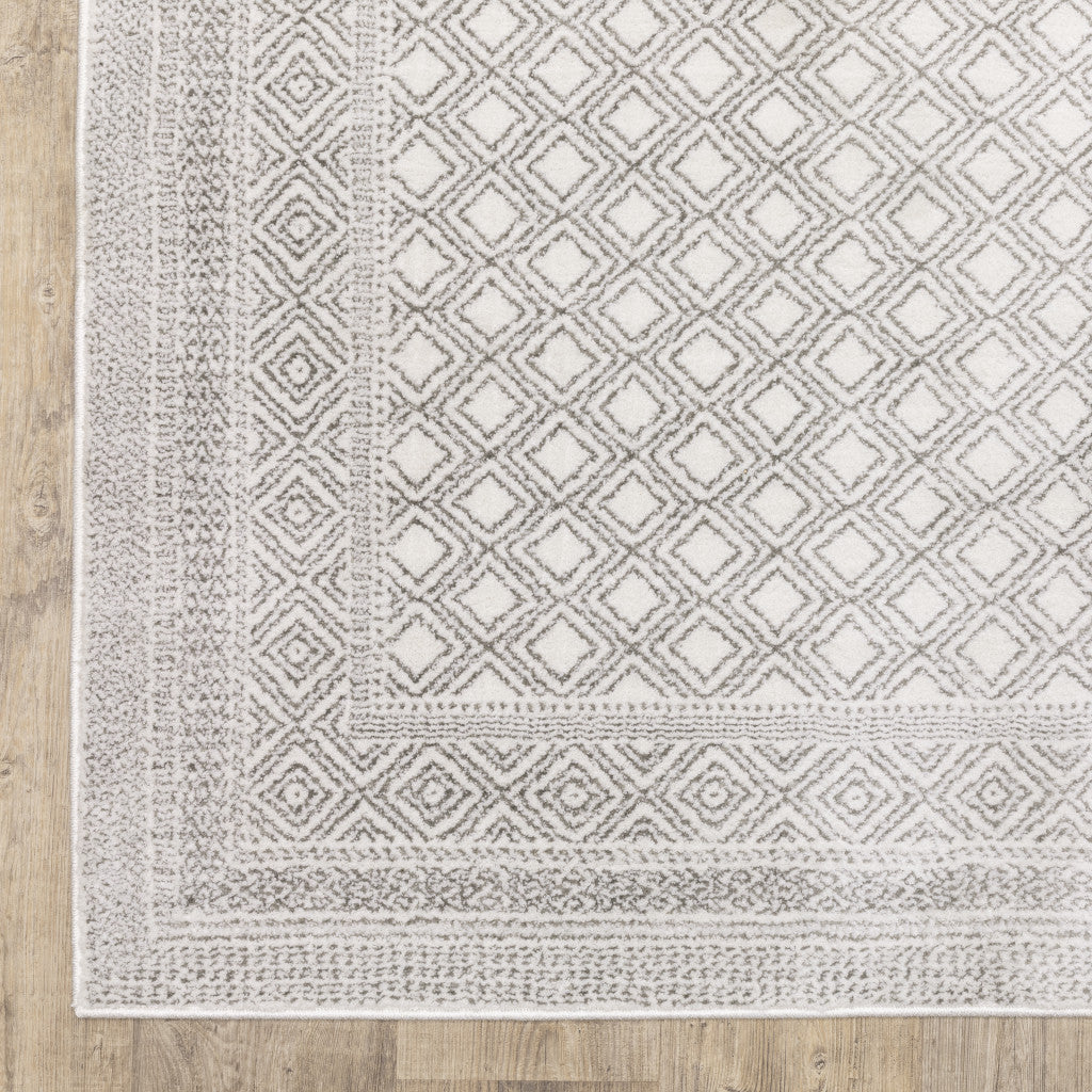 8' X 11' White And Grey Oriental Power Loom Stain Resistant Area Rug