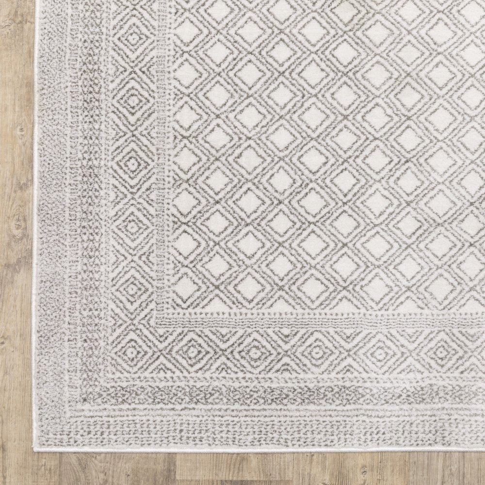 8' X 11' White And Gray Oriental Distressed Area Rug