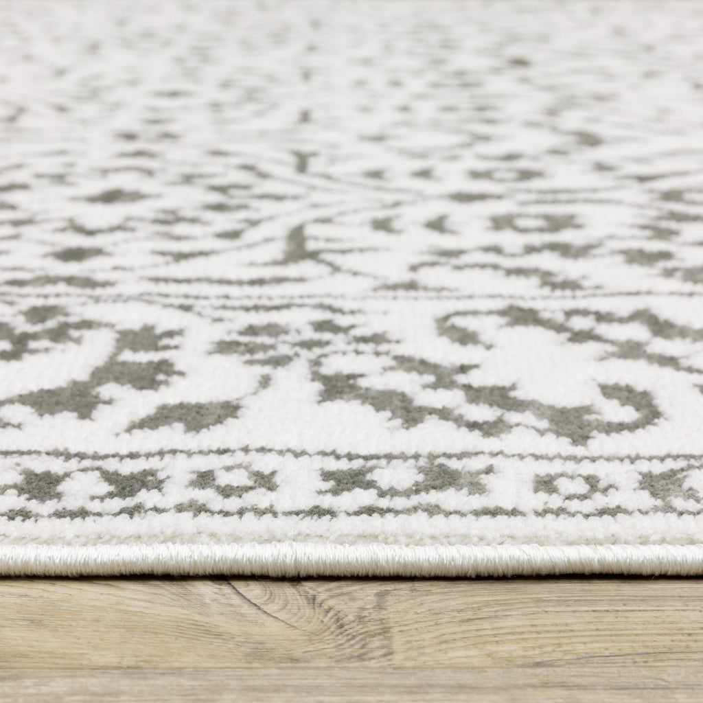 2' X 8' Grey And White Floral Power Loom Stain Resistant Runner Rug