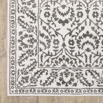 7' X 10' Gray And White Floral Distressed Area Rug