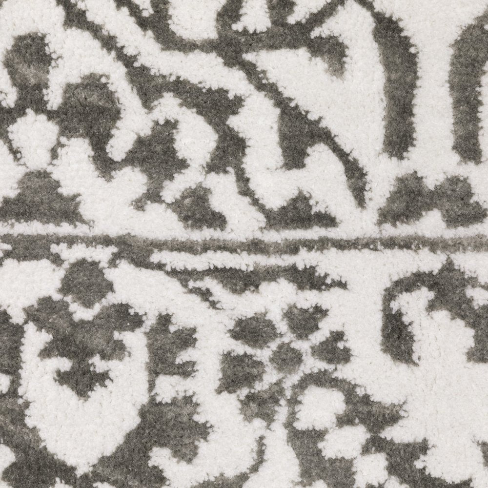 7' X 10' Gray And White Floral Distressed Area Rug