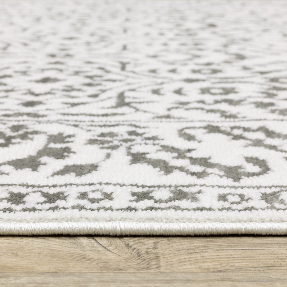 8' X 11' Gray And White Floral Distressed Area Rug