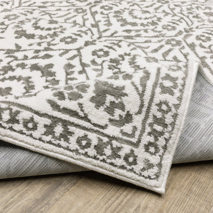 8' X 11' Gray And White Floral Distressed Area Rug