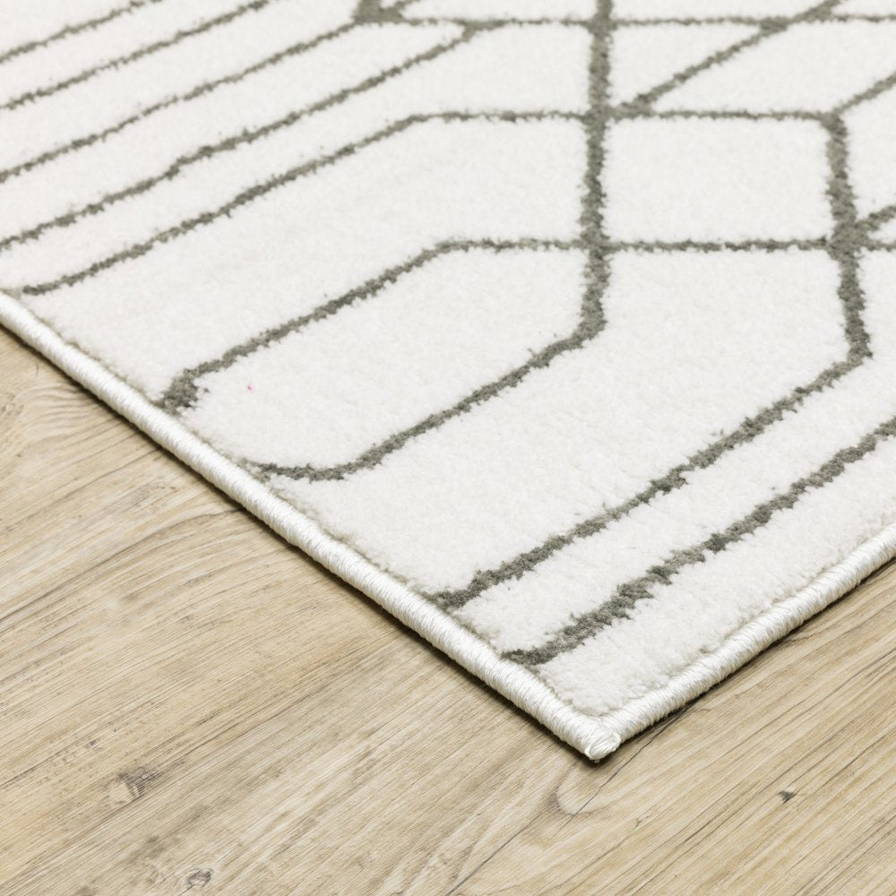 2' x 8' white and grey geometric runner rug; power loom; stain resistant.