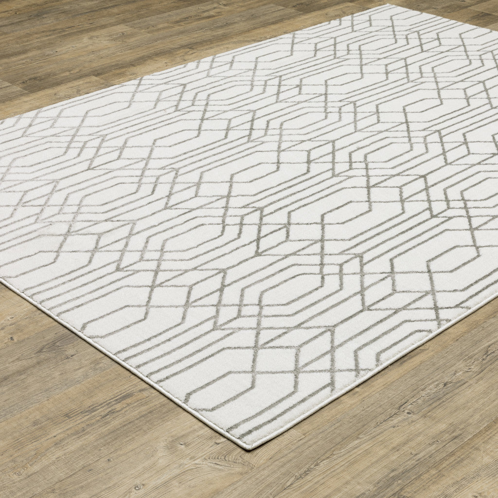 3' X 5' White And Grey Geometric Power Loom Stain Resistant Area Rug