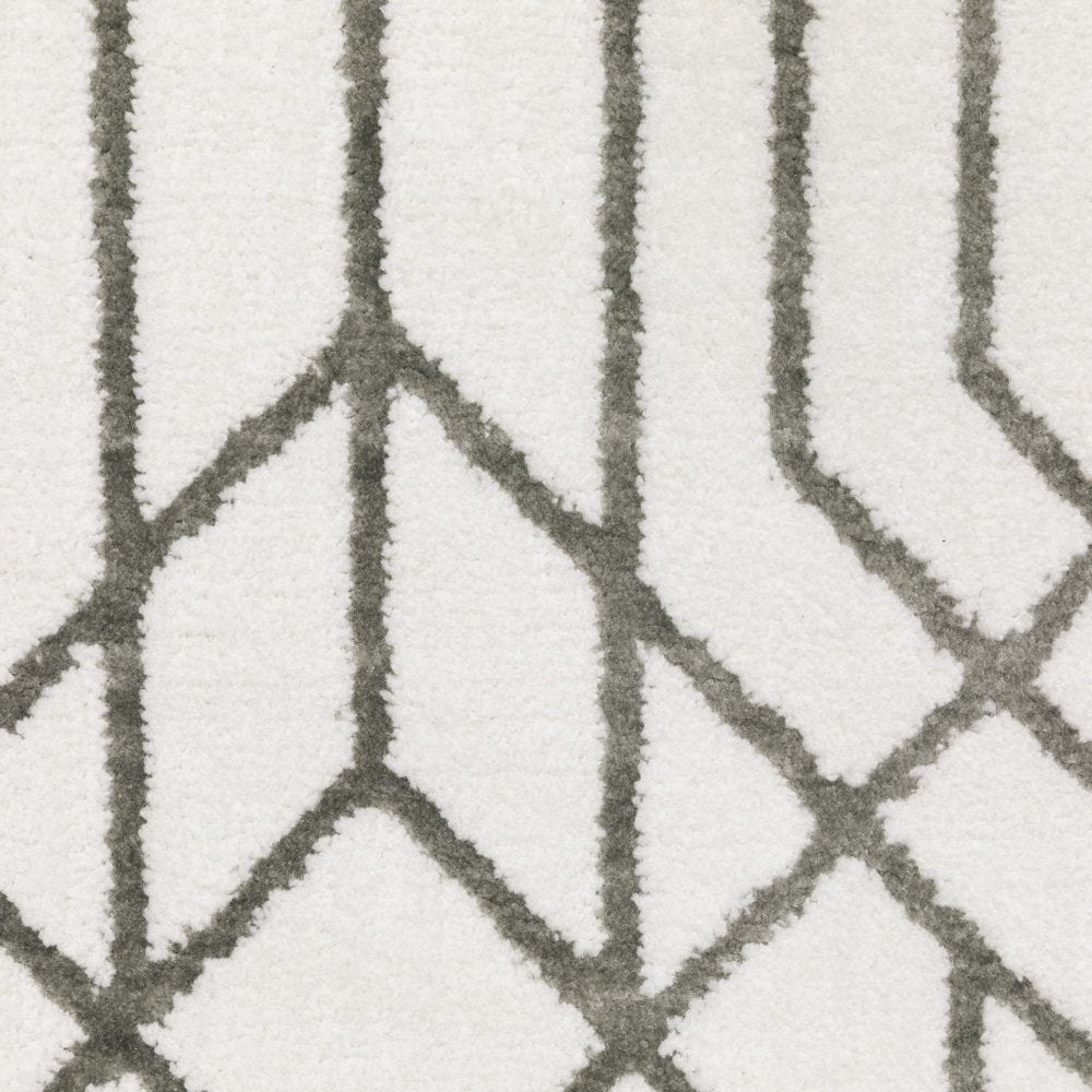 5' x 8' white and grey geometric power loom stain resistant area rug