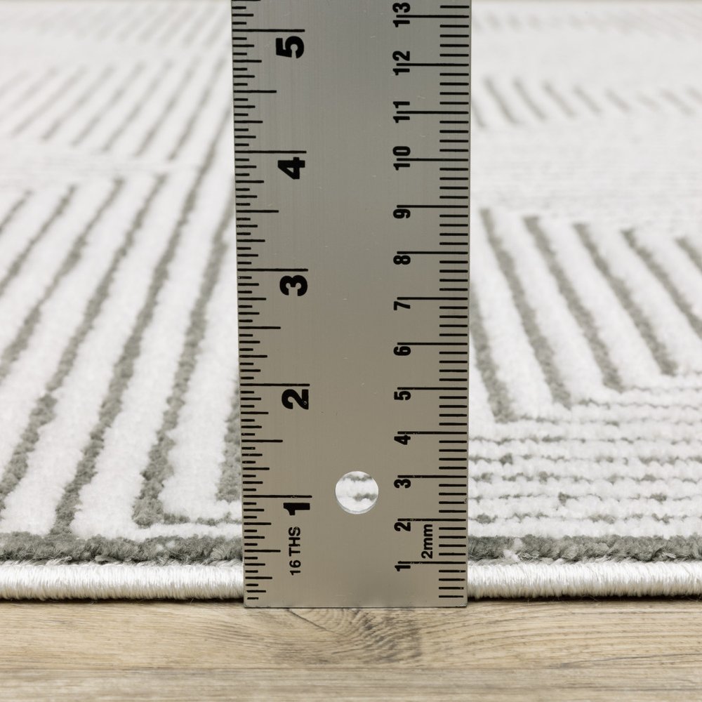 2' x 8' grey and white geometric runner rug, power loom, stain resistant.