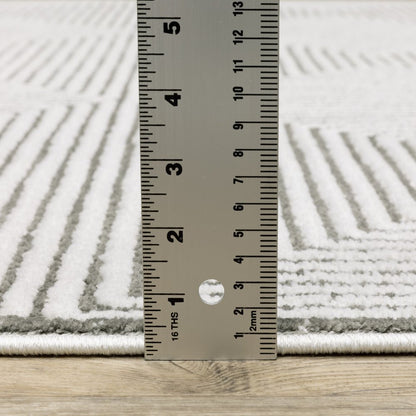 2' x 8' grey and white geometric runner rug, power loom, stain resistant.