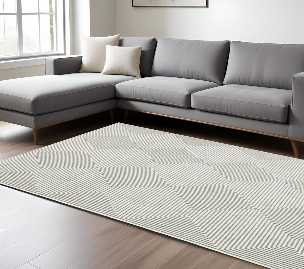 7' X 10' Gray And White Geometric Distressed Area Rug