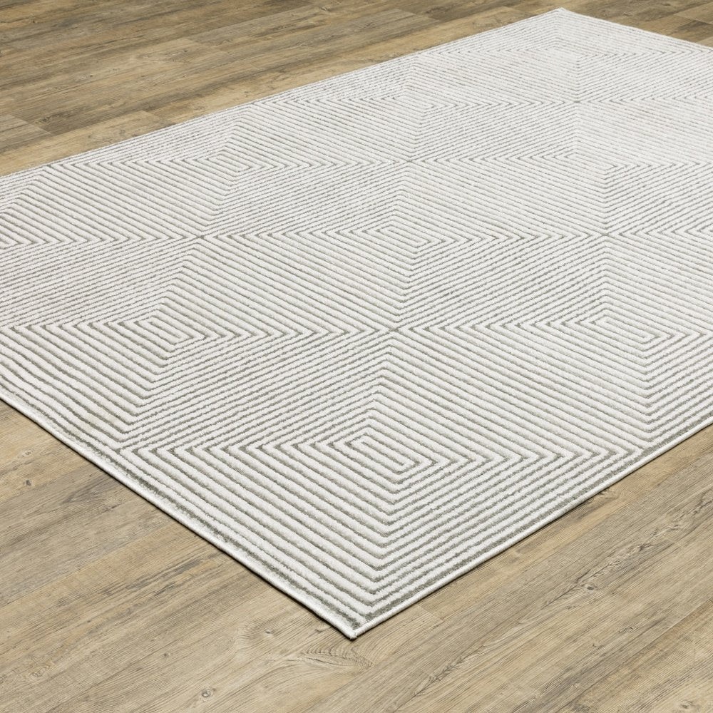 7' X 10' Gray And White Geometric Distressed Area Rug