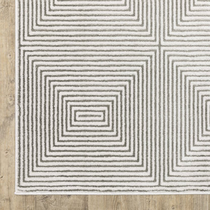 7' X 10' Gray And White Geometric Distressed Area Rug