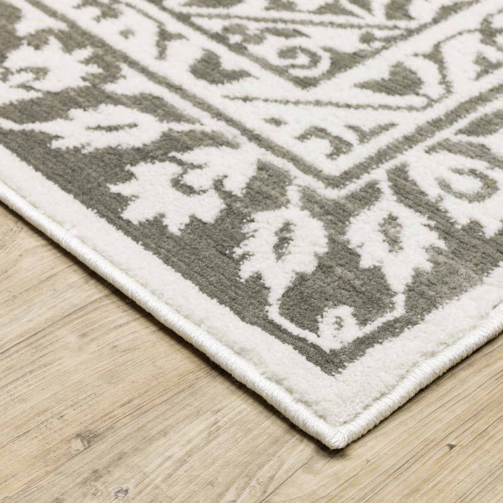 2' X 8' Grey And White Oriental Power Loom Stain Resistant Runner Rug