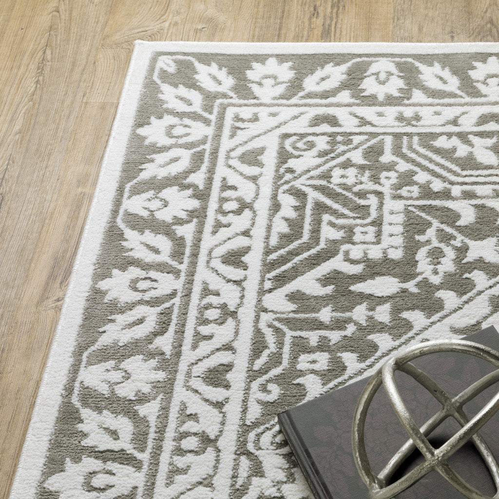 2' X 8' Grey And White Oriental Power Loom Stain Resistant Runner Rug