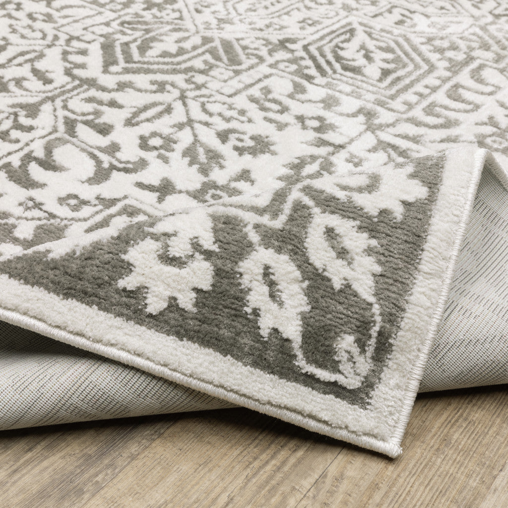 2' X 8' Grey And White Oriental Power Loom Stain Resistant Runner Rug