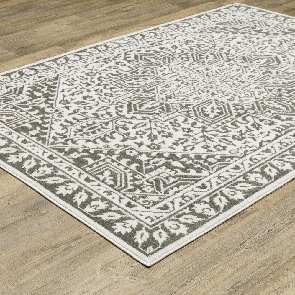 7' X 10' Gray And White Oriental Distressed Area Rug