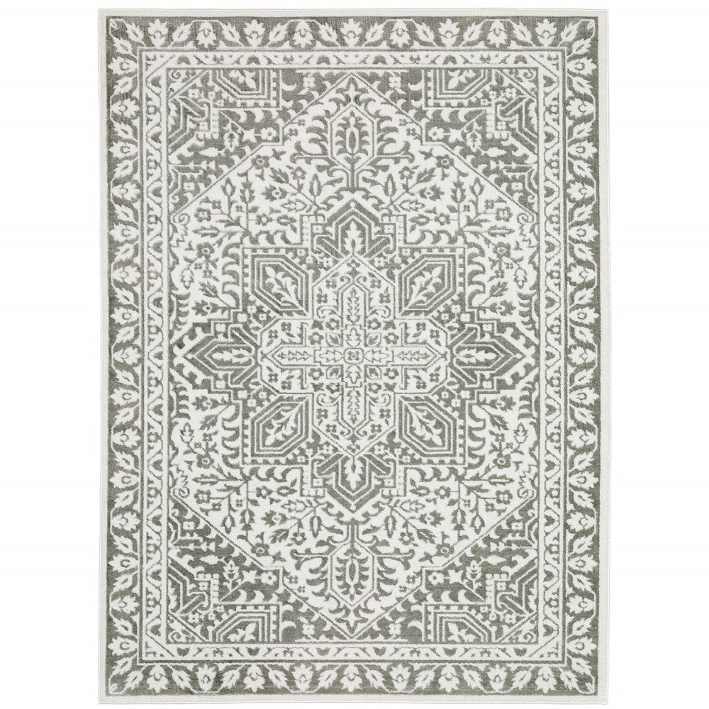 Gray and white distressed Oriental area rug, 8' X 11'.