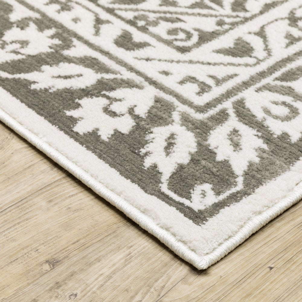 8' X 11' Gray And White Oriental Distressed Area Rug