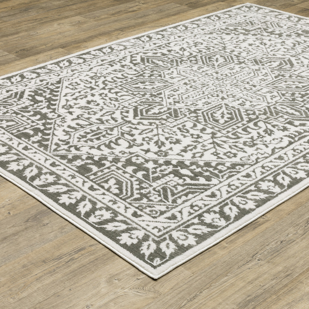 8' X 11' Grey And White Oriental Power Loom Stain Resistant Area Rug