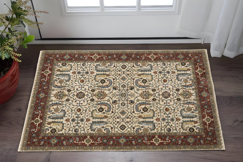 2' X 3' Ivory Red Green Grey Blue And Navy Oriental Power Loom Stain Resistant Area Rug With Fringe