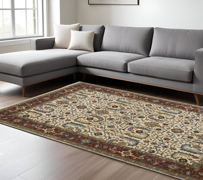 7' X 10' Ivory And Red Oriental Area Rug With Fringe