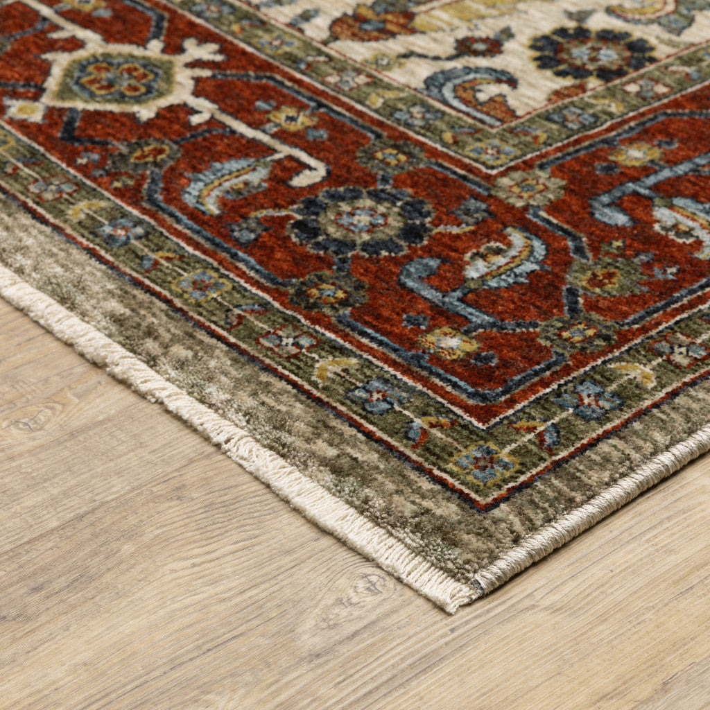 6' X 9' Ivory Red Green Grey Blue And Navy Oriental Power Loom Stain Resistant Area Rug With Fringe