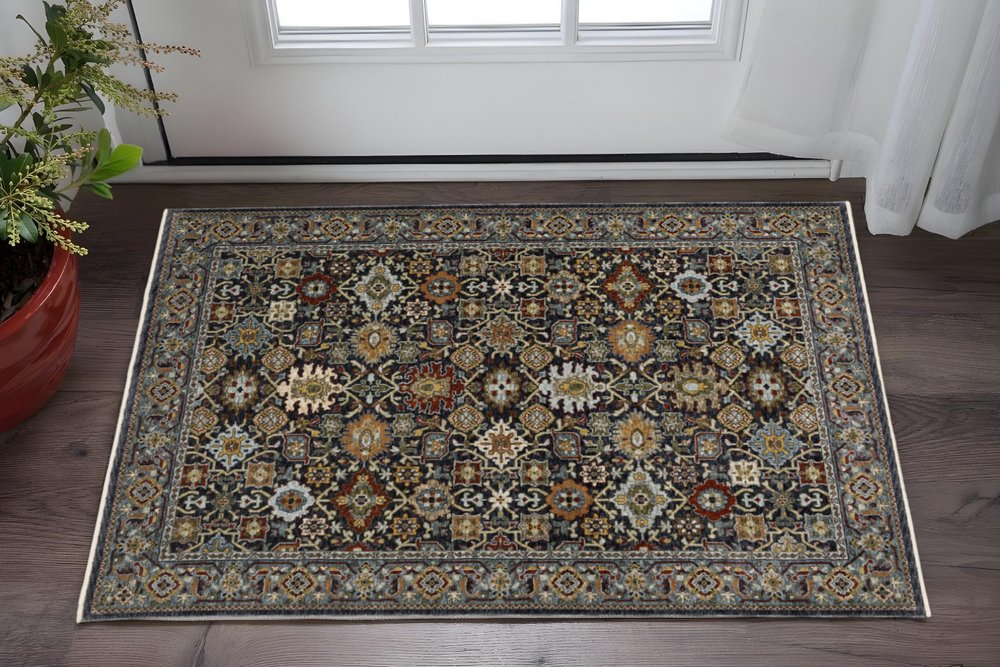 3' X 5' Blue Red Beige Orange Green And Rust Oriental Power Loom Stain Resistant Area Rug With Fringe