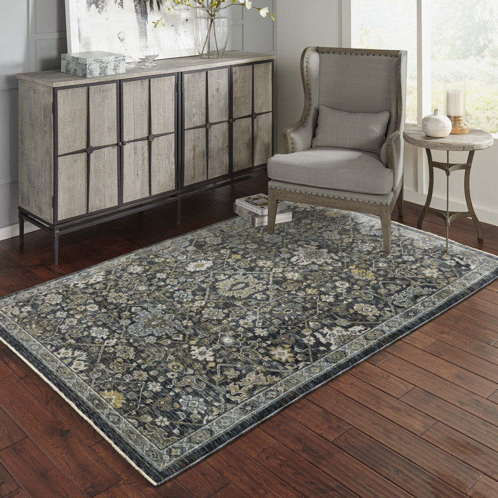 3' X 5' Blue Ivory Grey Gold Green And Brown Oriental Power Loom Stain Resistant Area Rug With Fringe