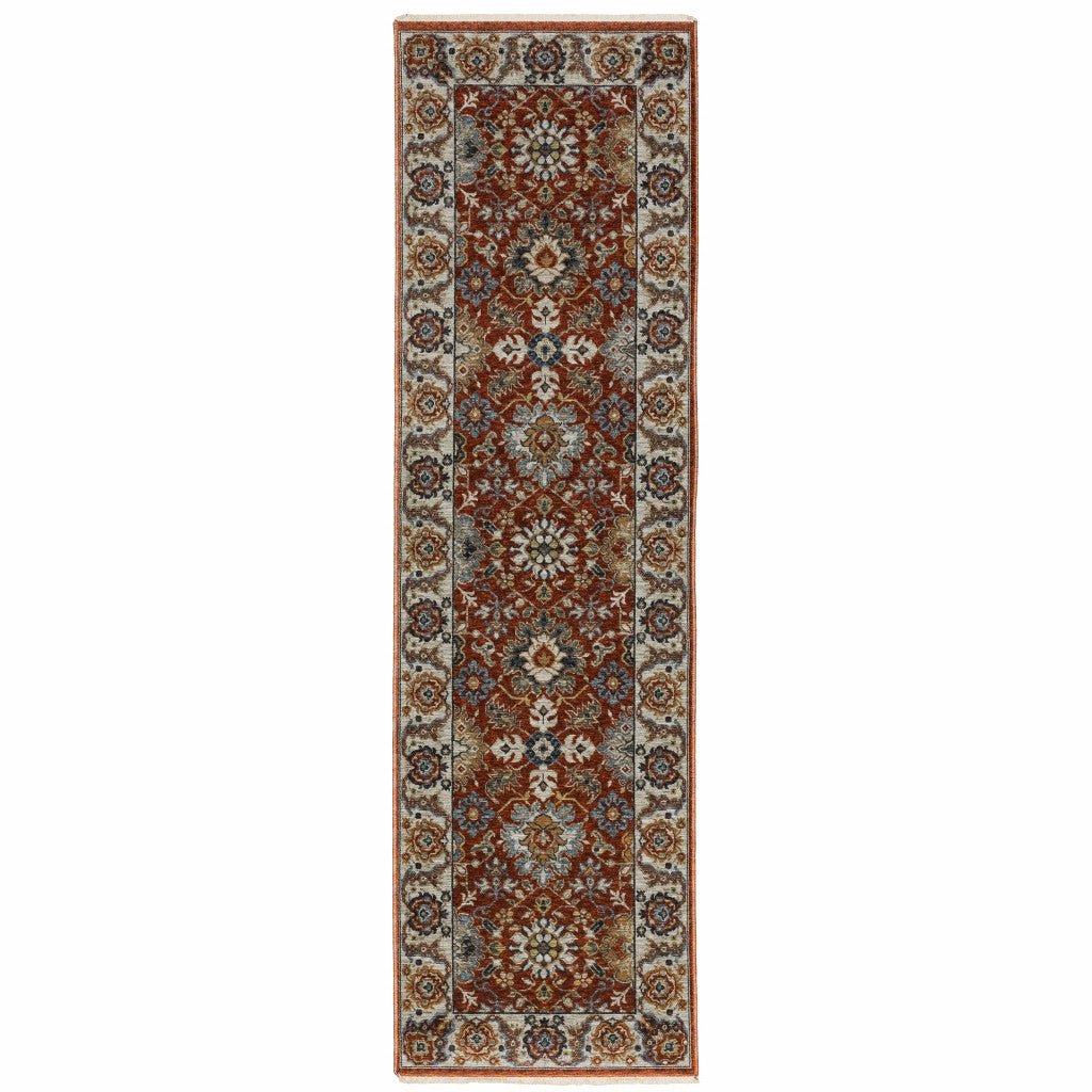 2' X 8' Red Blue Ivory Gold And Navy Oriental Power Loom Stain Resistant Runner Rug With Fringe