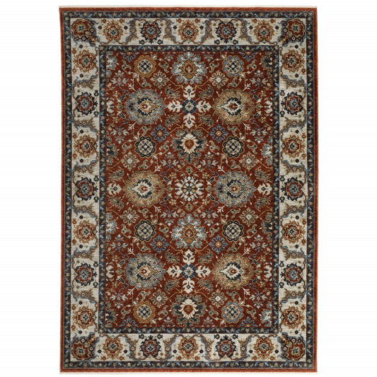 6' X 9' Red Blue Ivory Gold And Navy Oriental Power Loom Stain Resistant Area Rug With Fringe