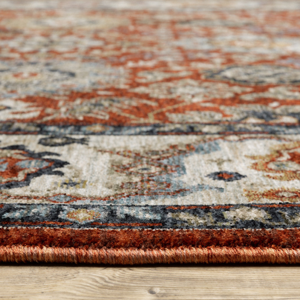 6' X 9' Red Blue Ivory Gold And Navy Oriental Power Loom Stain Resistant Area Rug With Fringe
