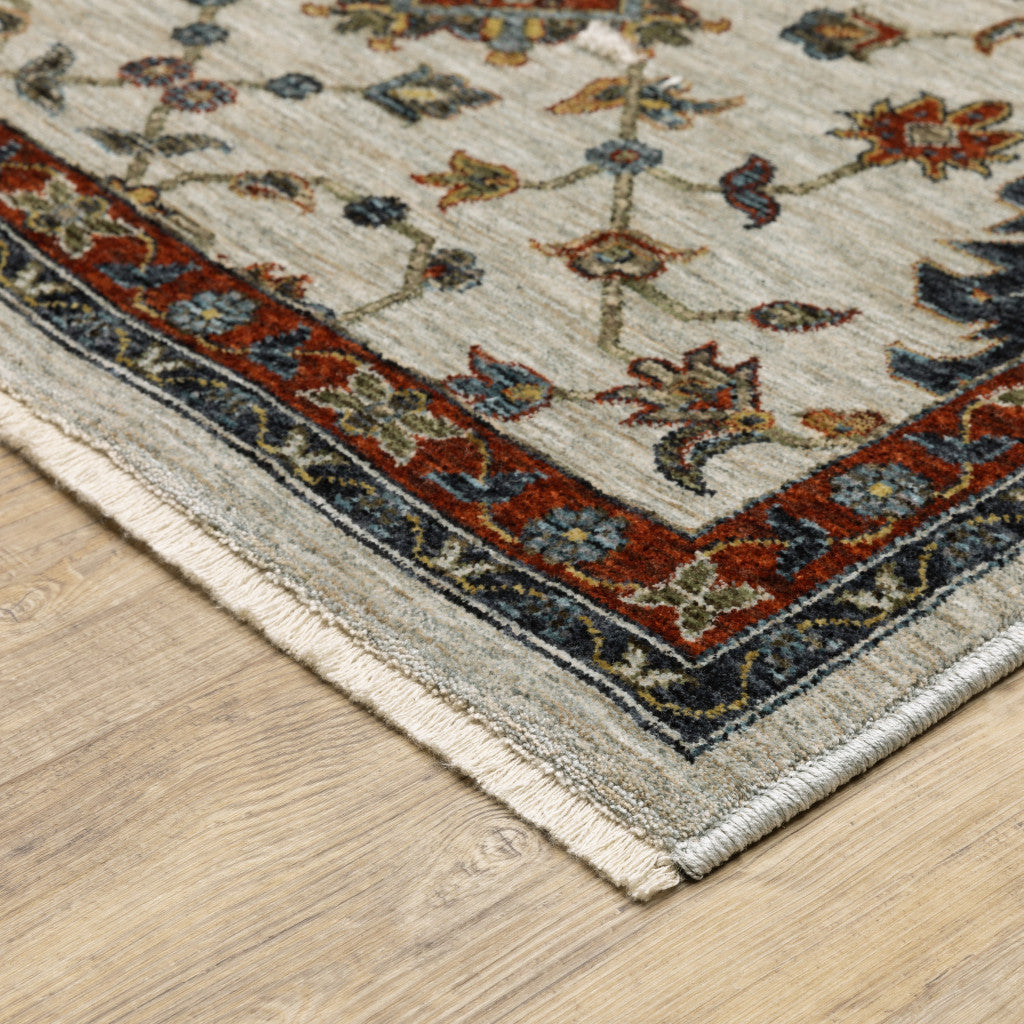 2' X 3' Ivory Grey Rust Red Gold And Shades Of Blue Oriental Power Loom Stain Resistant Area Rug With Fringe