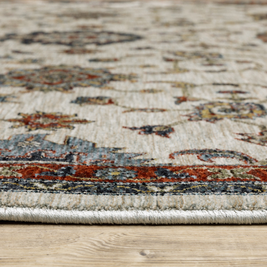 2' X 3' Ivory Grey Rust Red Gold And Shades Of Blue Oriental Power Loom Stain Resistant Area Rug With Fringe