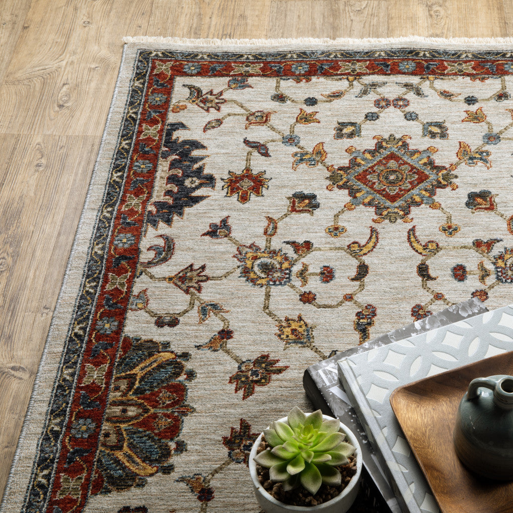 2' X 3' Ivory Grey Rust Red Gold And Shades Of Blue Oriental Power Loom Stain Resistant Area Rug With Fringe