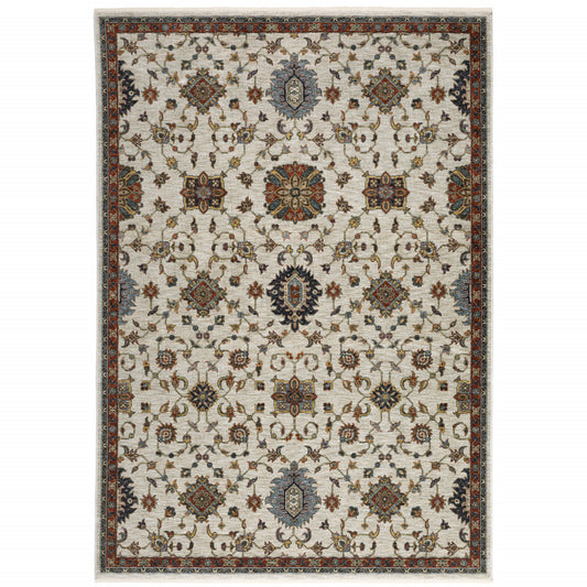 5' X 8' Beige Rust Red Blue Gold And Grey Oriental Power Loom Stain Resistant Area Rug With Fringe