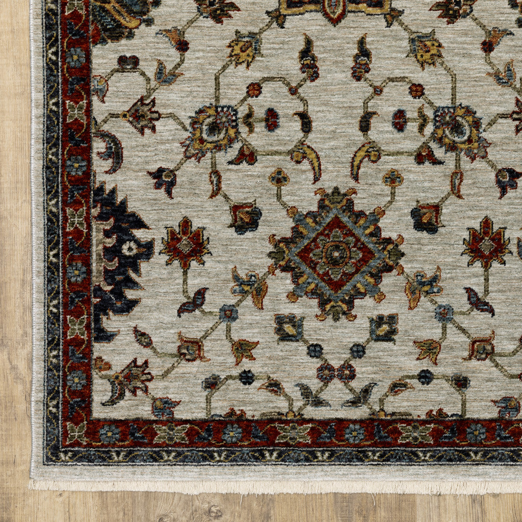 10' X 13' Beige Rust Red Blue Gold And Grey Oriental Power Loom Stain Resistant Area Rug With Fringe