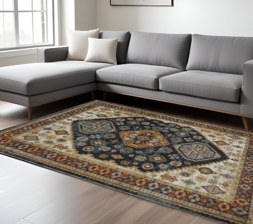 10' X 13' Blue Red Beige Orange Gold And Tan Oriental Power Loom Stain Resistant Area Rug With Fringe