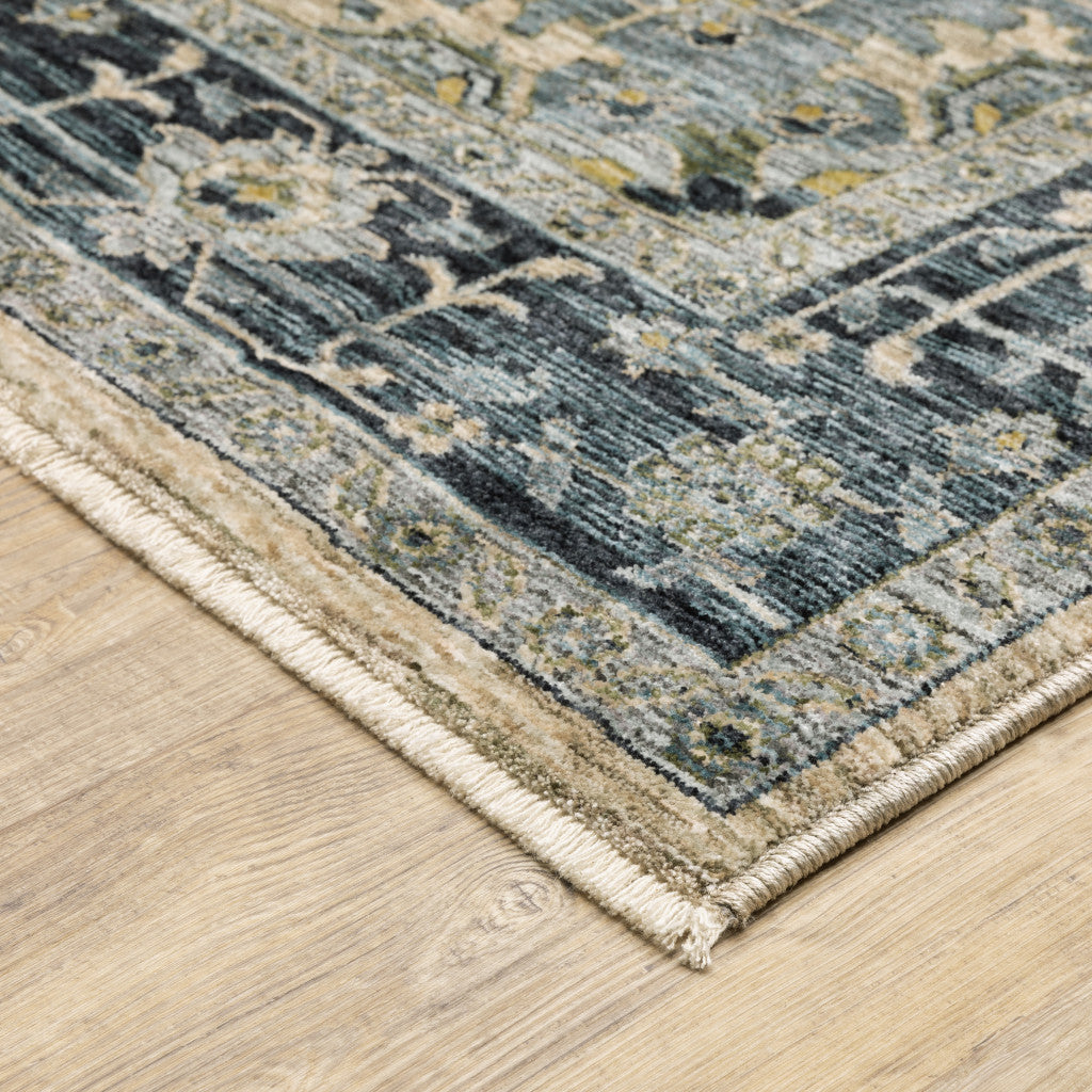 5' X 8' Blue Grey Beige Tan Green And Gold Oriental Power Loom Stain Resistant Area Rug With Fringe