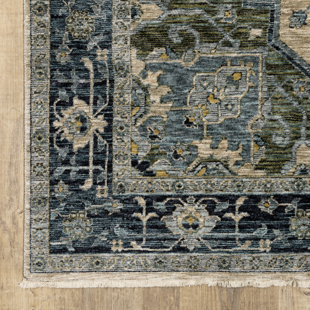 5' X 8' Blue Grey Beige Tan Green And Gold Oriental Power Loom Stain Resistant Area Rug With Fringe