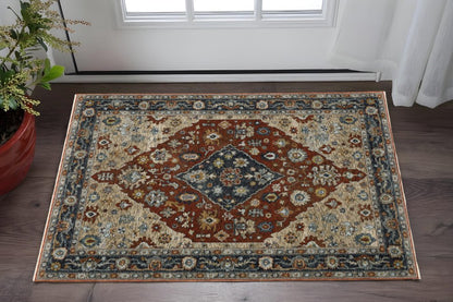 2' X 3' Blue Beige Tan Brown Gold And Rust Red Oriental Power Loom Stain Resistant Area Rug With Fringe