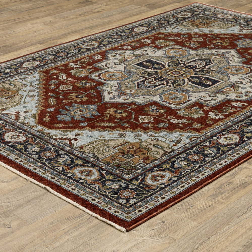 5' X 8' Blue Beige Grey Gold Green And Rust Red Oriental Power Loom Stain Resistant Area Rug With Fringe
