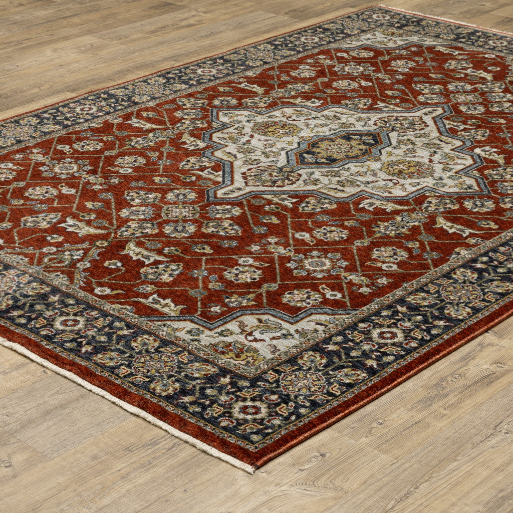 2' X 3' Red Ivory Blue Navy Gold And Grey Oriental Power Loom Stain Resistant Area Rug With Fringe
