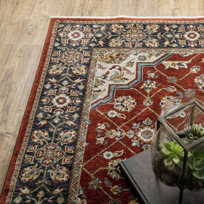 5' X 8' Red Ivory Blue Navy Gold And Grey Oriental Power Loom Stain Resistant Area Rug With Fringe