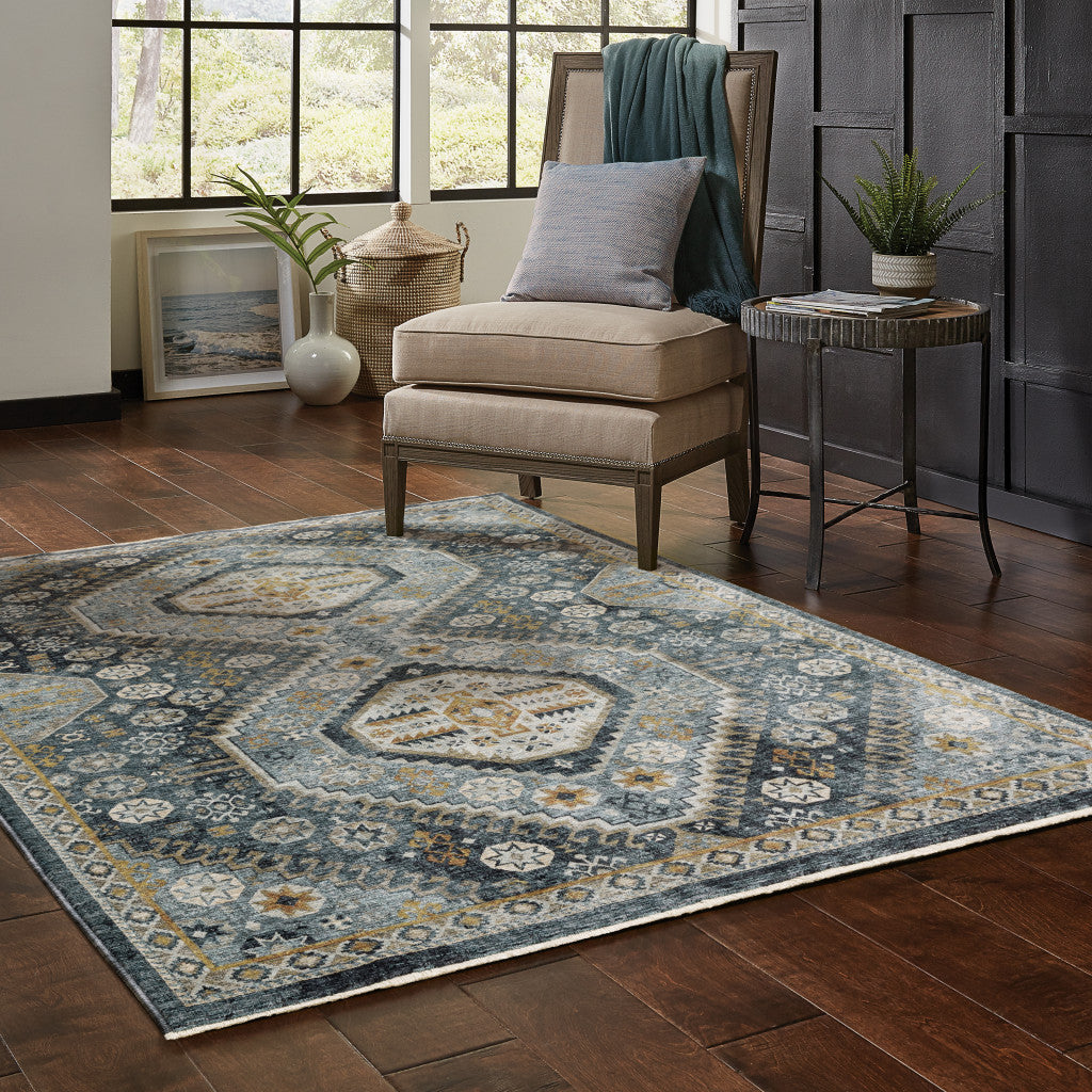 2' X 3' Light Blue Navy Gold Ivory And Grey Oriental Power Loom Stain Resistant Area Rug With Fringe