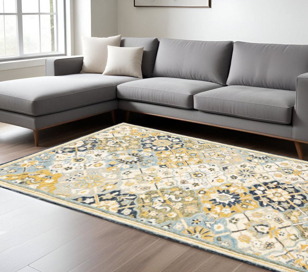 10' X 13' Blue Green Gold Navy And Ivory Geometric Tufted Handmade Stain Resistant Area Rug
