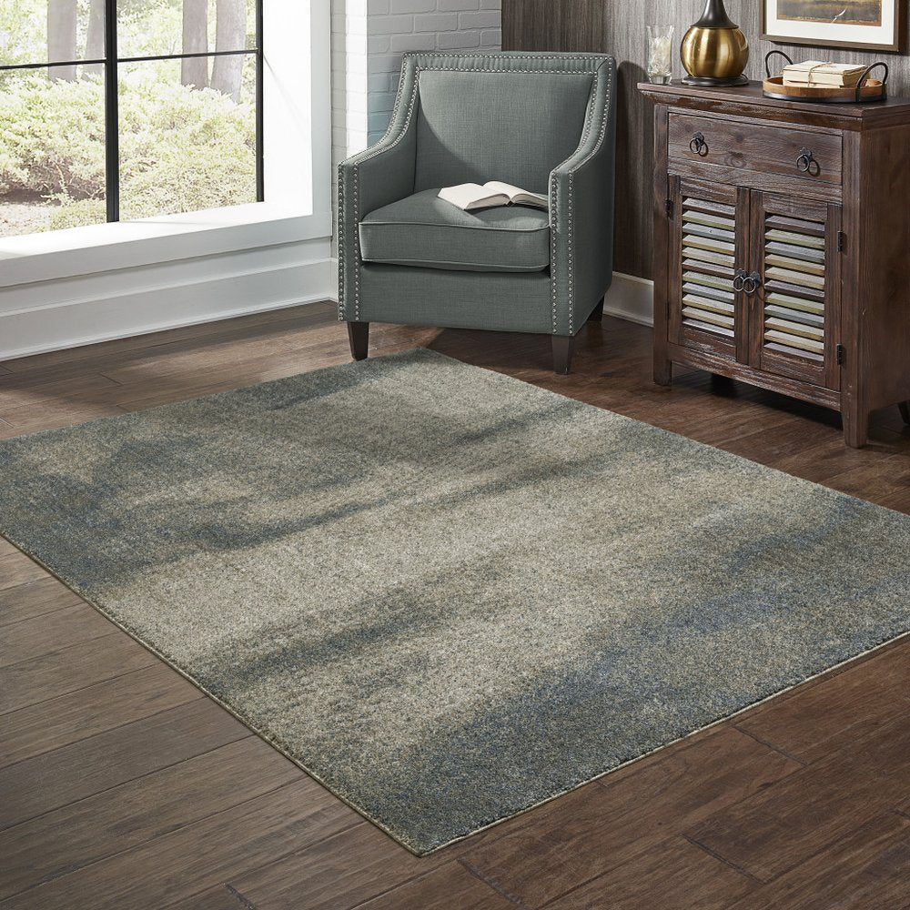 5' X 8' Beige And Blue Abstract Distressed Area Rug