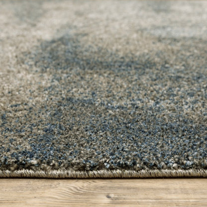 5' X 8' Beige And Blue Abstract Distressed Area Rug