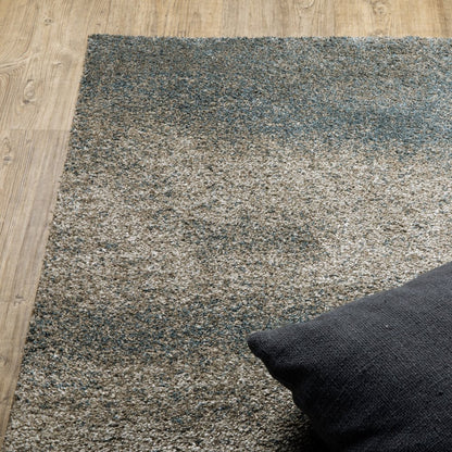 5' X 8' Beige And Blue Abstract Distressed Area Rug