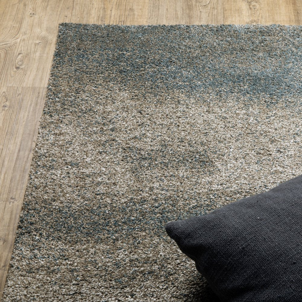 5' X 8' Beige And Blue Abstract Distressed Area Rug