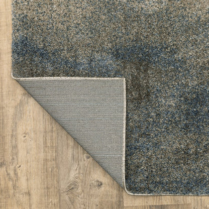 5' X 8' Beige And Blue Abstract Distressed Area Rug